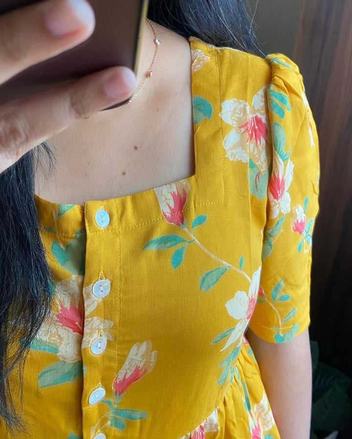 Beautiful mango yellow with floral print dress