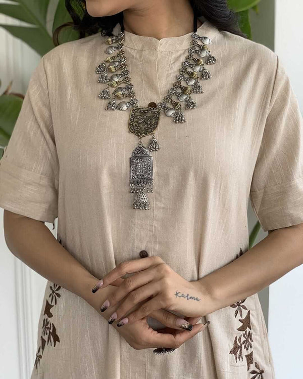 Cotton Suit beige A-line cotton suit for women with embroidered details and ethnic silver necklace