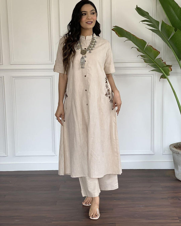 Cotton Suit A-line cotton suit for women in beige with button details and embroidery
