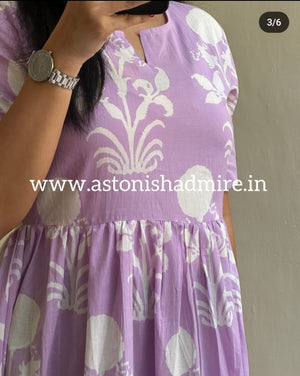 Close-up of THREAD JAIPUR purple print middy gown with white floral patterns and gathered waist detailing