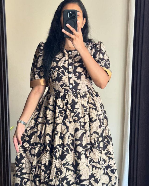 Azrak print summer dress by Jaipuri Pehnawa with black and beige floral design and gold sleeve cuffs