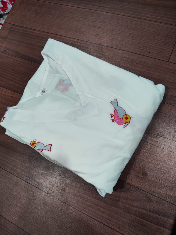  Cotton Suit bird embroidery dress for women white gown with colorful bird design folded on wooden floor