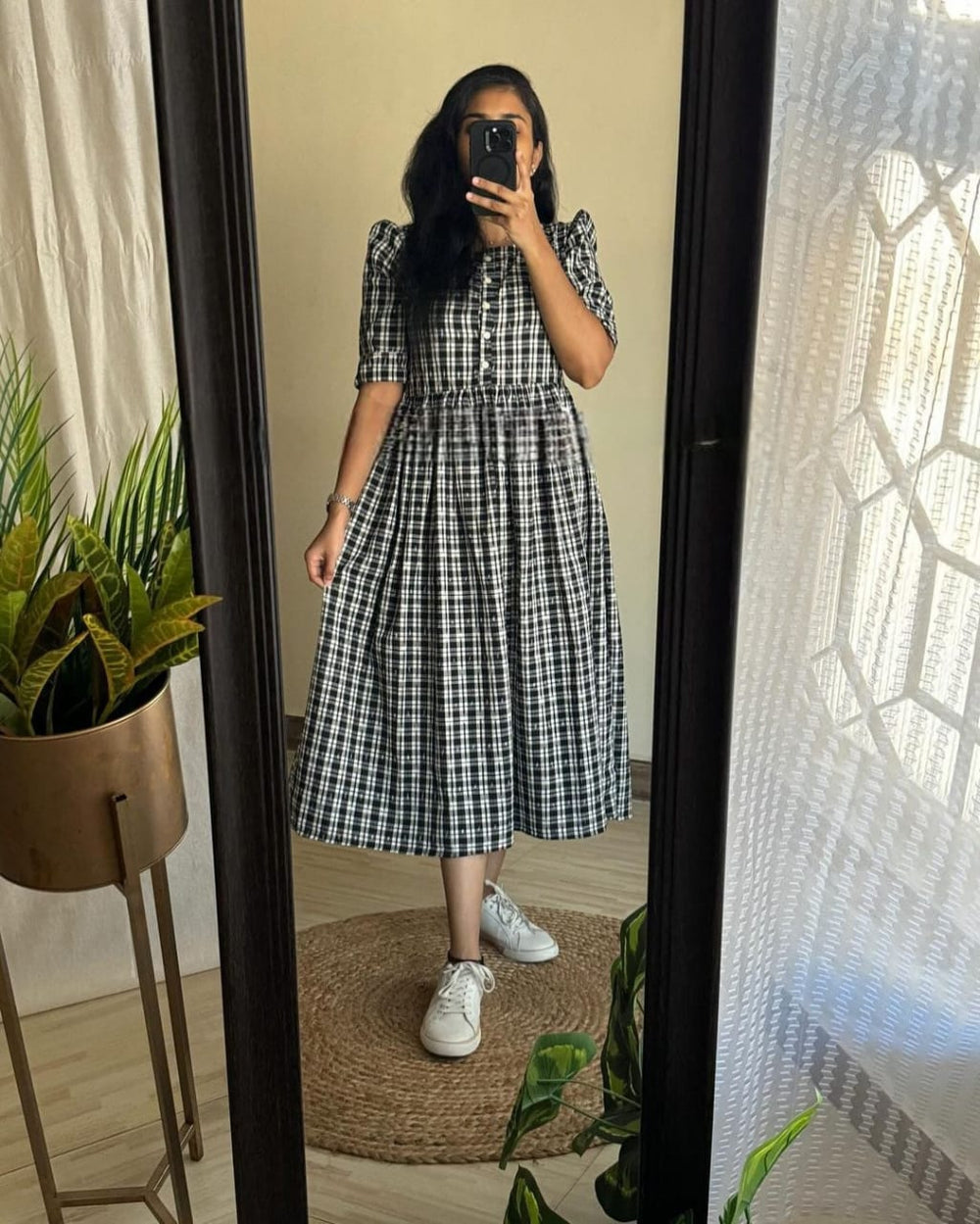 Cotton Suit black and white cotton middy gown with button-down front and puff sleeves worn with white sneakers