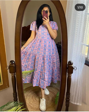 Sugamdha blue cotton midi dress gown with puff sleeves and tiered skirt worn by woman