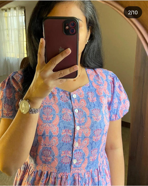 Sugamdha blue cotton midi dress with pink floral print and button front detail