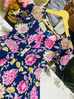  Cotton Suit blue floral cotton midi dress with pink and yellow flower patterns on hanger