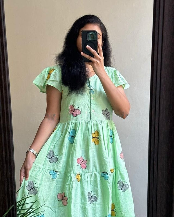 casual cotton middy dress for women in light green with colorful butterfly prints