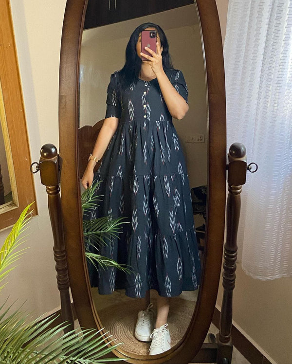 Casual summer cotton gown for women in dark color with white pattern, worn with white sneakers