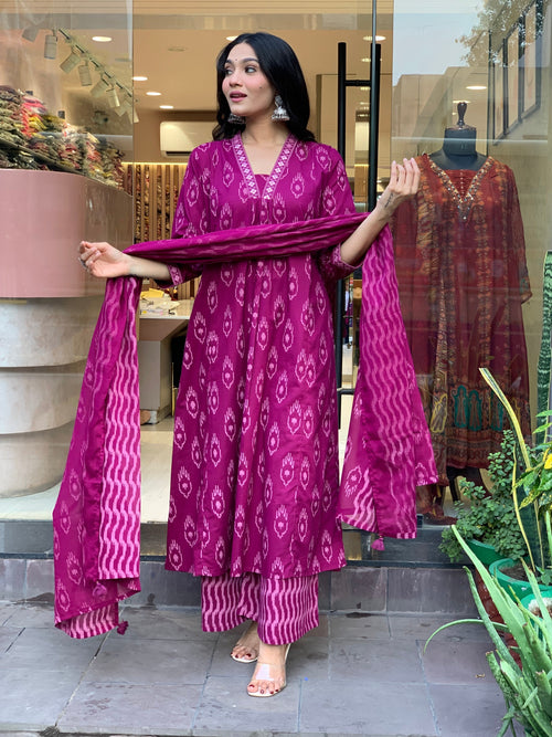 Cotton Suit cotton embroidered kurta pant dupatta set in magenta with traditional patterns worn by a model