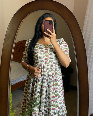 Cotton Suit elephant print cotton dress with puff sleeves and gathered waist in white background
