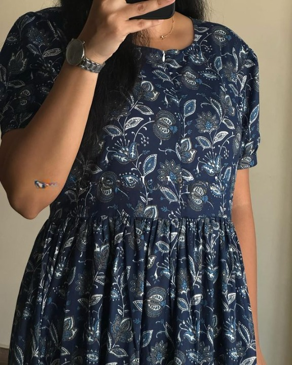 Sugamdha floral midi dress for women in navy blue with white and light blue flower patterns