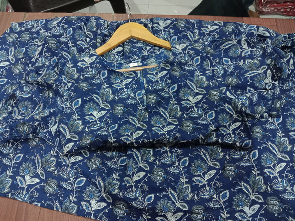 Sugamdha floral midi dress for women in blue with white leaf and flower patterns on a wooden hanger