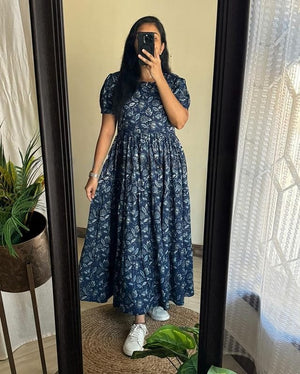 Sugamdha floral midi dress for women in navy blue with puff sleeves and a gathered waist