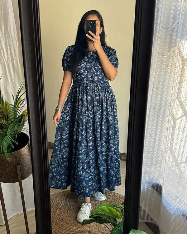 Sugamdha floral midi dress for women in navy blue with puff sleeves and a gathered waist