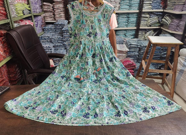 Cotton Suit floral patterned women's summer maxi dress gown displayed on table in a fabric store