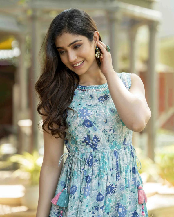 Cotton Suit floral gown styled as a women's summer maxi dress with blue and green pattern and tassel details