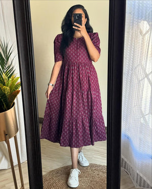 Cottonsuit floral printed cotton maxi dress in maroon worn with white sneakers