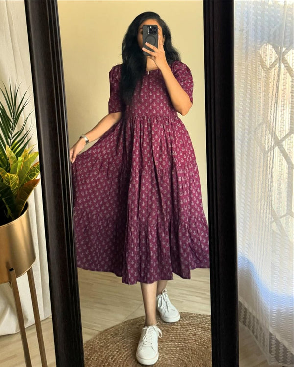 Cottonsuit floral printed cotton maxi dress in purple worn with white sneakers