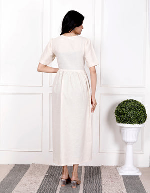 Cotton Suit off white cotton gown for women with short sleeves and gathered waist shown from back