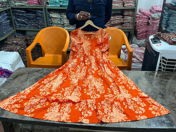  Cotton Suit orange cotton midi gown for women with floral print displayed on a table