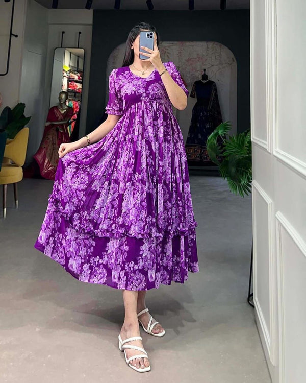 Jaipuri pehnawa purple floral flowy maternity gown worn by woman taking mirror selfie