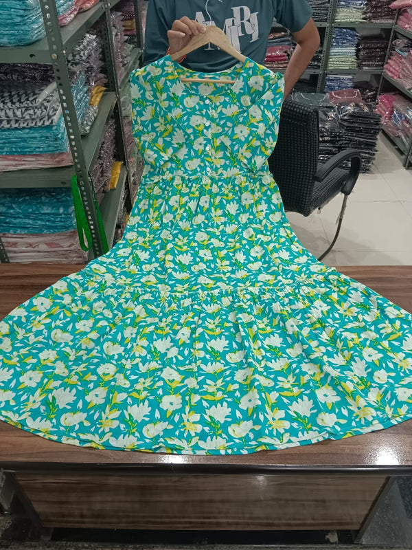  Cotton Suit green cotton midi dress for women with white floral print displayed on wooden table