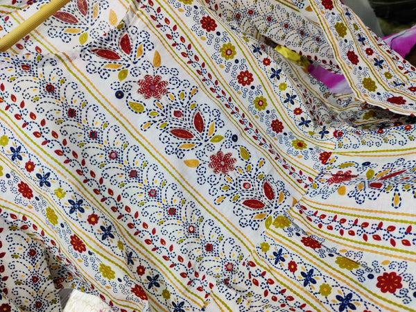 Cotton Suit multicolor printed cotton dress with detailed floral and geometric patterns on lightweight fabric