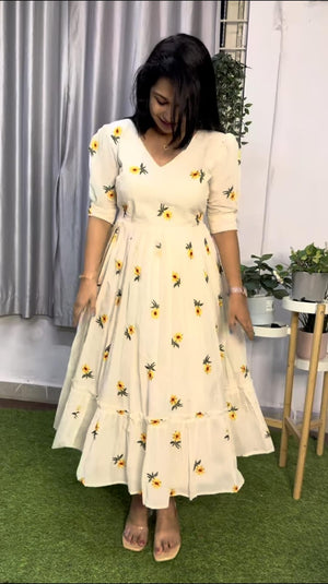  Cotton Suit white cotton embroidered midi dress with yellow floral patterns and three-quarter sleeves