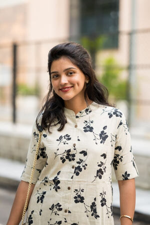 Cotton Suit women's cotton co-ord set featuring a white top with black floral print and three-quarter sleeves