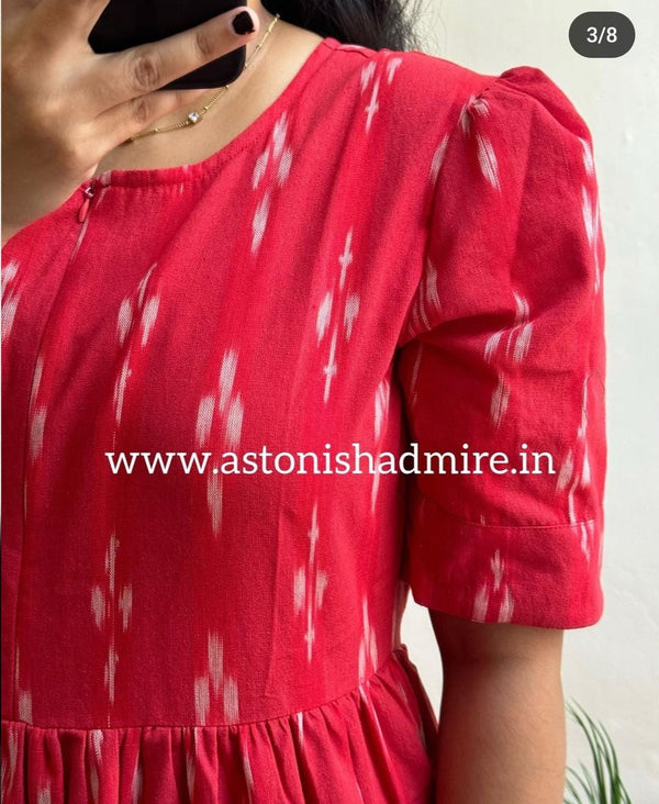 Close-up of red women's ikkat print gown with puff sleeves by THREAD JAIPUR