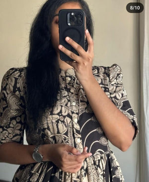  Cotton Suit women's ikkat print midi dress with intricate black and beige patterns and puff sleeves