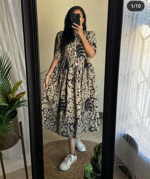  Cotton Suit women's ikkat print midi dress in black and beige worn with white sneakers