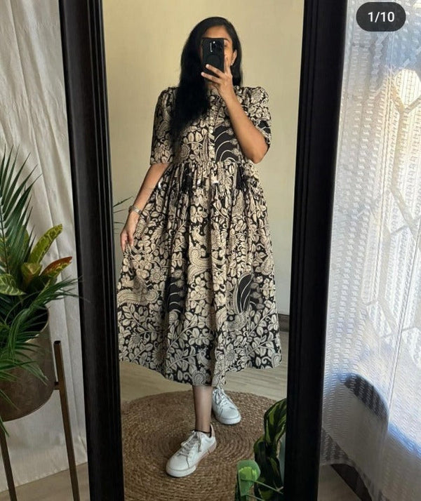  Cotton Suit women's ikkat print midi dress in black and beige worn with white sneakers