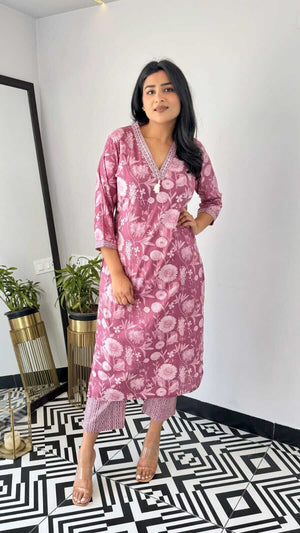 Cotton Suit yellow and pink office wear kurta with floral print and matching pants styled by a woman