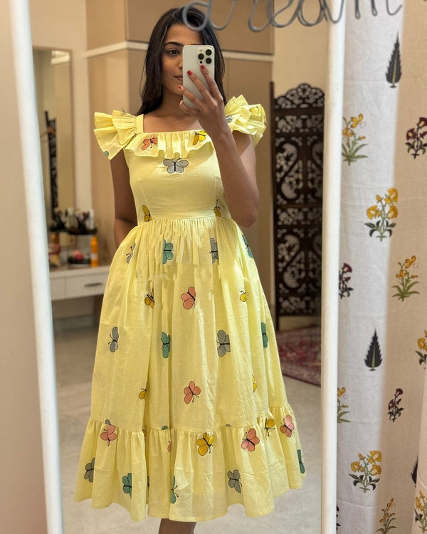  yellow cotton midi gown for women with butterfly print and ruffle sleeves